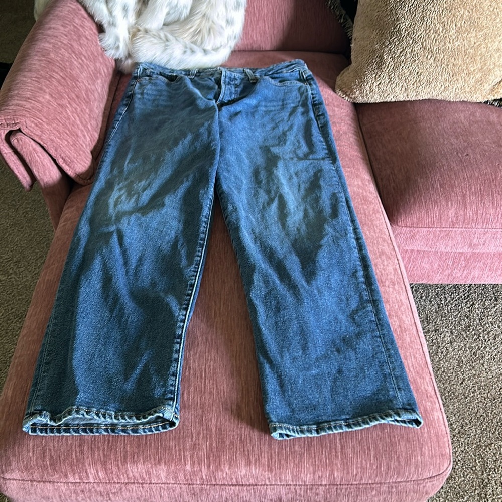 Low Rise Dark Wash Denim Bootcut Jeans. Stretchy Fit.